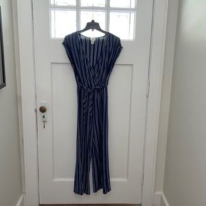 Blue/white striped jumper. Size medium.
